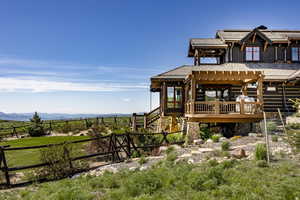 Exterior space featuring a pergola and a deck with mountain view