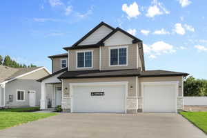 Craftsman-style home with a garage