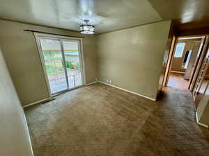 View of carpeted spare room