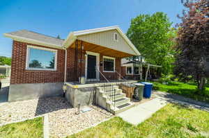 View of front of home featuring covered porch