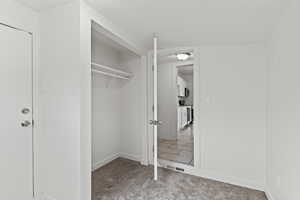 Closet featuring visible vents