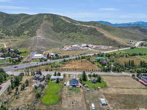 Birds eye view of property with a mountain view