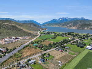 Bird's eye view featuring a water and mountain view