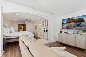 Bedroom featuring ceiling fan and hardwood / wood-style flooring