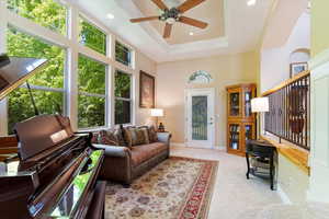 Living Room with picturesque windows ushering in ample natural daylight