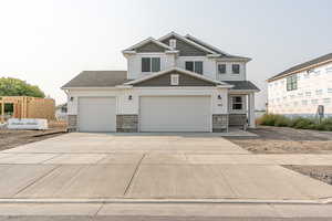 View of front of home with a garage