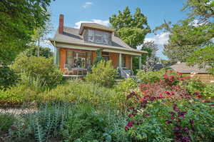 View of front of home featuring covered porch