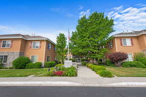 View of front of property with a front yard