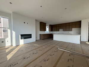 Kitchen featuring  brown cabinets