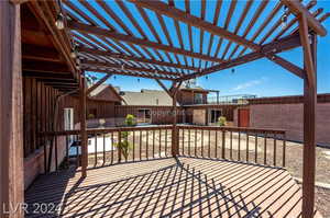 Wooden deck with a pergola