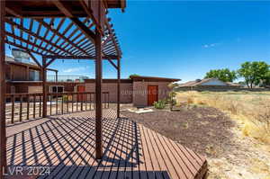 Wooden terrace with a pergola