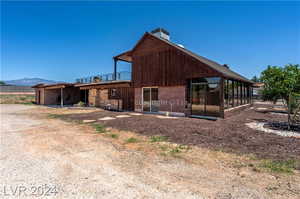 Rear view of house with a mountain view