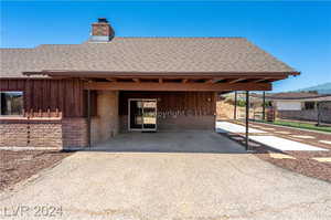 View of front facade featuring a carport