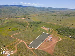 Bird's eye view with a mountain view and a rural view