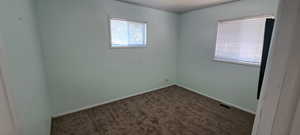 View of carpeted spare room