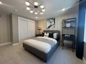 basement bedroom  - image is of furnished model home - actual finishes may differ - furnishings not included