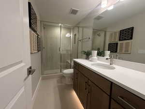 basement bathroom  - image is of furnished model home - actual finishes may differ - furnishings not included