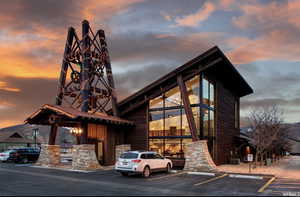 Outdoor building at dusk with central AC