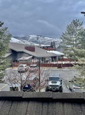 View of front of property featuring a mountain view