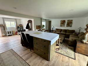 Kitchen featuring light hardwood / wood-style floors and a kitchen island