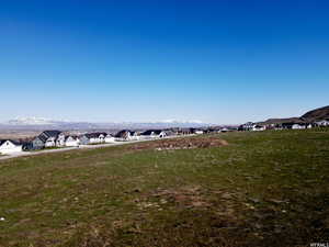 View of yard with a mountain view