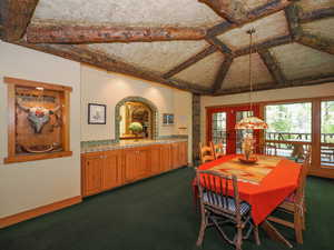 Dining room built-in wall case, kitchen pass-though with sliding doors, porch access