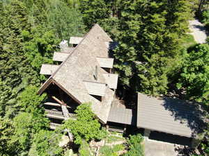 Log and river stone architectural details of the West side