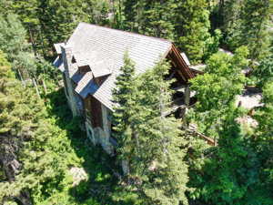 Northwest aerial view catching that gorgeous A-frame shake roof