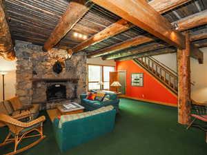 Floor-to-ceiling family room stone hearth