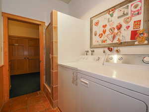 Shower stall and laundry off pantry