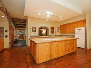 Dining room and entryway views from kitchen