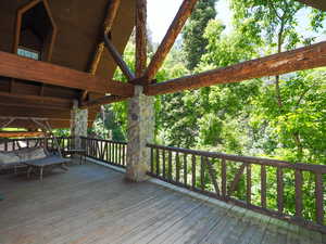 Stunning stone, wooden beam, and log architectural features on the second story porch. These wood and mountain views are what Sundance is about