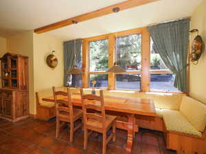 Kitchen breakfast nook with custom table and natural light