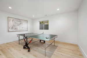 Recreation room featuring light hardwood / wood-style flooring