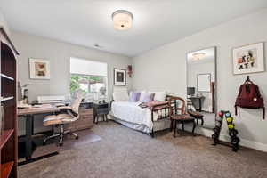 View of carpeted bedroom