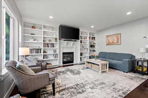 Family room featuring hardwood / wood-style floors