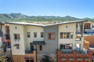 View of front of home featuring a mountain view