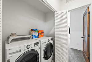 Laundry area with washing machine and dryer