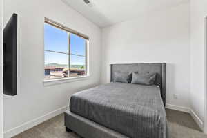 View of carpeted bedroom