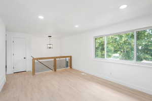 Empty room featuring light hardwood / wood-style floors