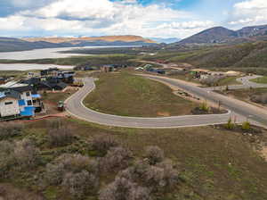 Birds eye view of property featuring Lake/mountain view