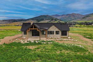 View of front of house featuring a mountain view