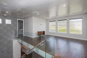 Interior space featuring dark hardwood / wood-style flooring