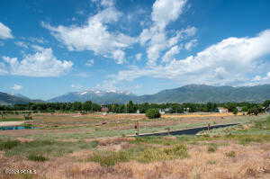 Property view of mountains featuring a rural view