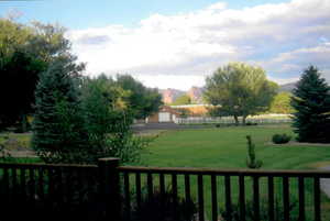 View of yard featuring a mountain view and a rural view