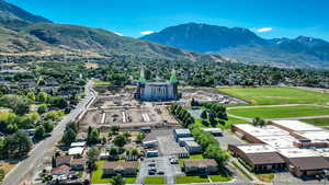 Drone / aerial view featuring a mountain view, located about 1.5 miles away.