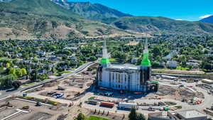 Drone / aerial view featuring a mountain view, located about 1.5 miles away.