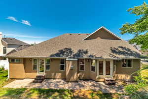 Back of property with a patio area.