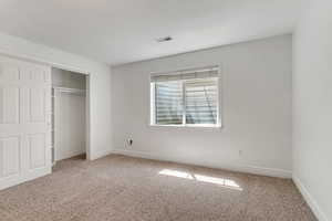 Bedroom featuring a closet organizer.