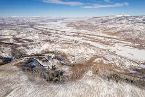 Snowy aerial view with a mountain view